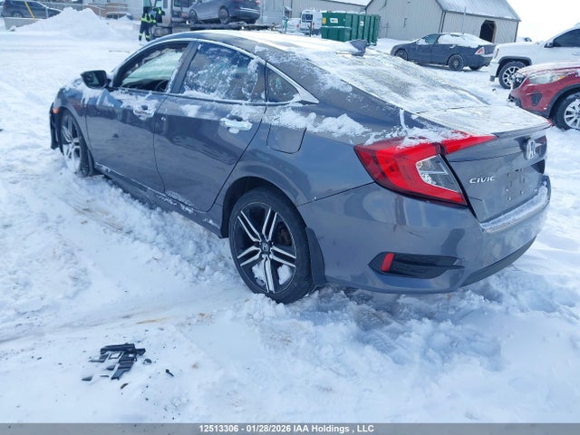 12513306 :رقم المزاد ، 2HGFC1F94HH100673 vin ، 2017 Honda Civic Touring مزاد بيع