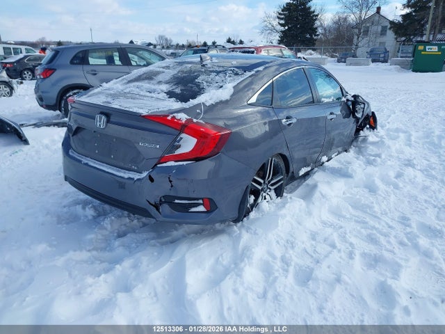 12513306 :رقم المزاد ، 2HGFC1F94HH100673 vin ، 2017 Honda Civic Touring مزاد بيع