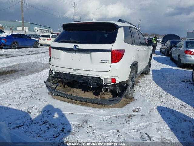 5FNYF8H9XPB503064 Honda Passport Touring
