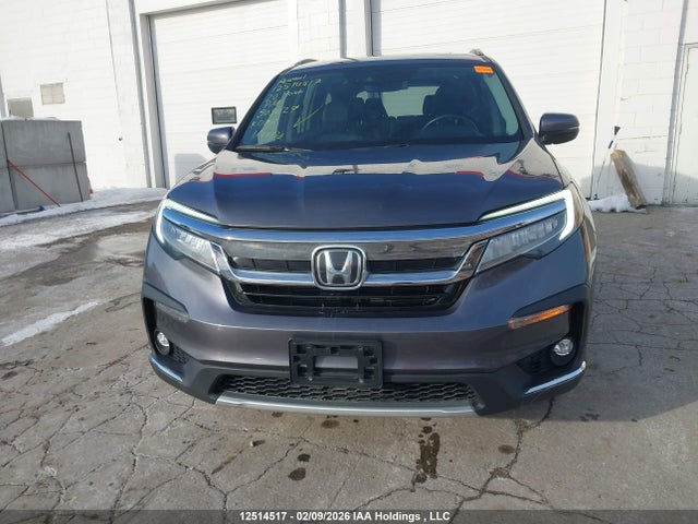 12514517 :رقم المزاد ، 5FNYF6H62LB503029 vin ، 2020 Honda Pilot Touring مزاد بيع