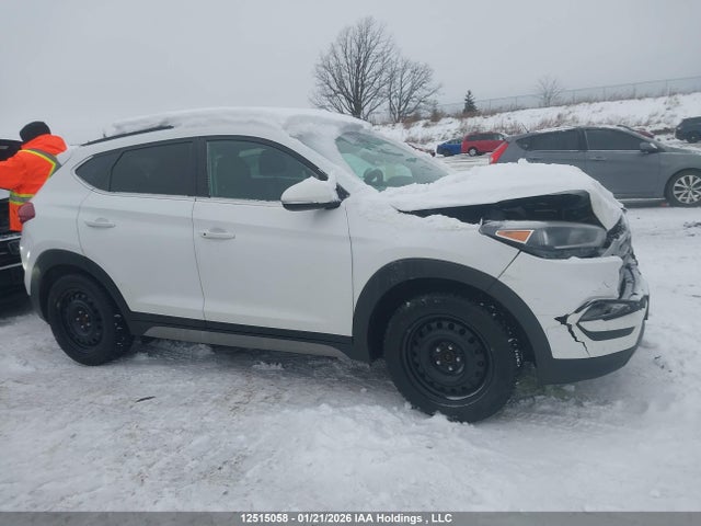 KM8J3CA43HU553854 Hyundai Tucson