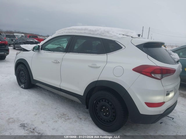 KM8J3CA43HU553854 Hyundai Tucson