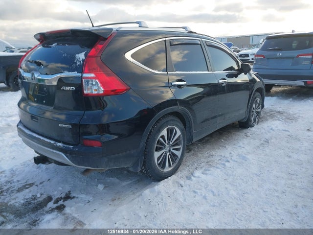 12516934 :رقم المزاد ، 5J6RM4H93GL809677 vin ، 2016 Honda Cr-v Touring مزاد بيع