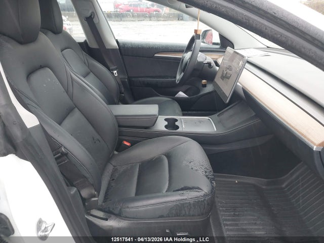 Продажа на аукционе авто 2023 Tesla Model 3, vin: 5YJ3E1EB2PF699318, номер лота: 12517541