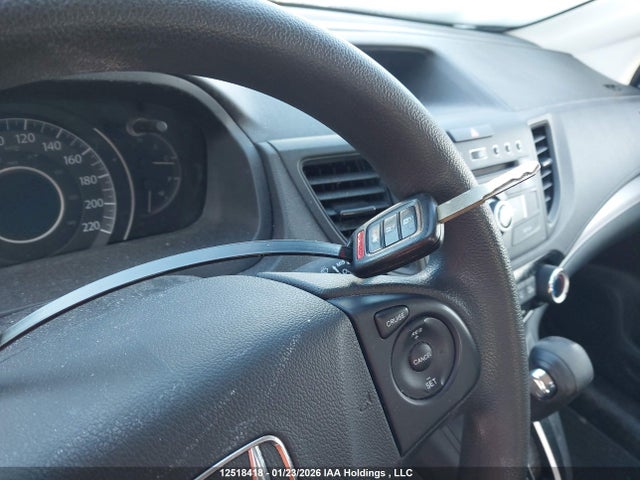2HKRM4H34GH107504 Honda CR-V LX