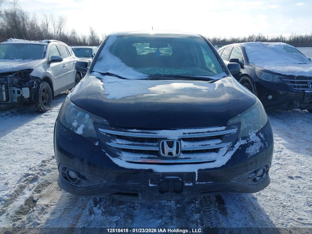 2HKRM4H34GH107504 Honda CR-V LX