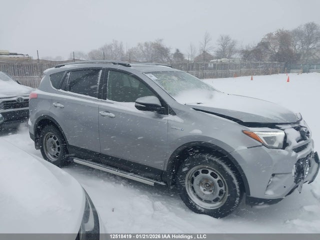 Продаж на аукціоні авто 2018 Toyota Rav4 Hv Limited, vin: JTMDJREV1JD256536, номер лоту: 12518419