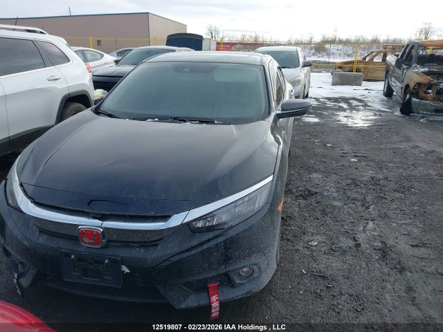 2HGFC1F97JH102083 Honda Civic Touring