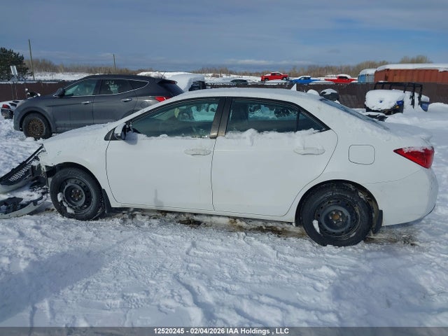 2T1BURHE6KC165142 Toyota Corolla