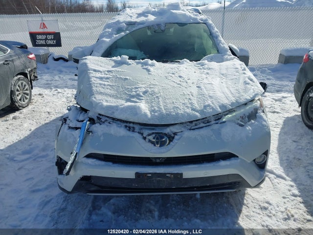 12520420 :رقم المزاد ، JTMDJREV6JD242972 vin ، 2018 Toyota Rav4 Hybrid Limited مزاد بيع