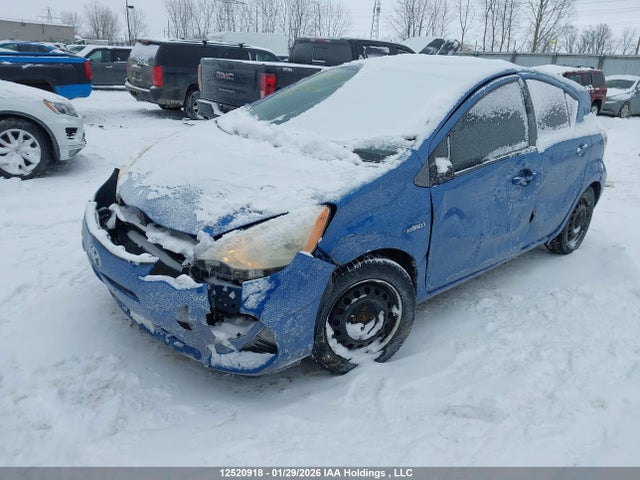 JTDKDTB33E1558318 Toyota PRIUS C