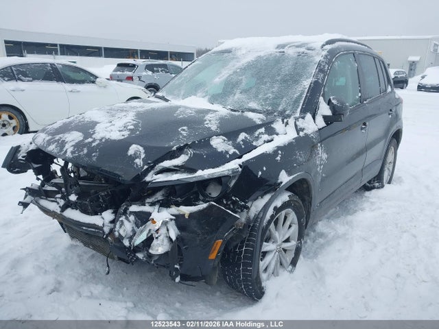 Продажа на аукционе авто 2014 Volkswagen Tiguan, vin: WVGJV3AX4EW584874, номер лота: 12523543