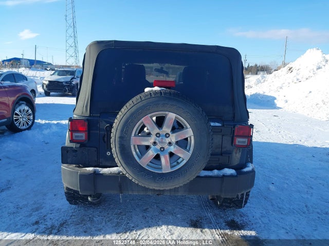 1C4AJWAG1GL294713 Jeep Wrangler Sport