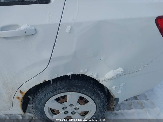 1G1JA5EH2E4198943 Chevrolet Sonic