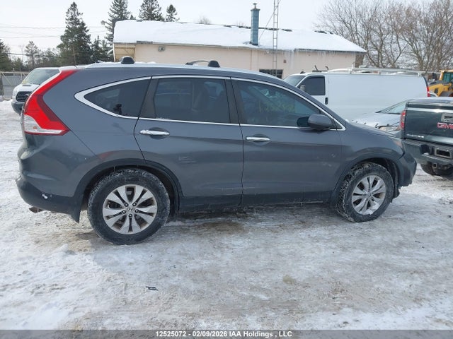 2014 Honda Cr-v Touring მანქანა იყიდება აუქციონზე, vin: 2HKRM4H91EH100348, აუქციონის ნომერი: 12525072