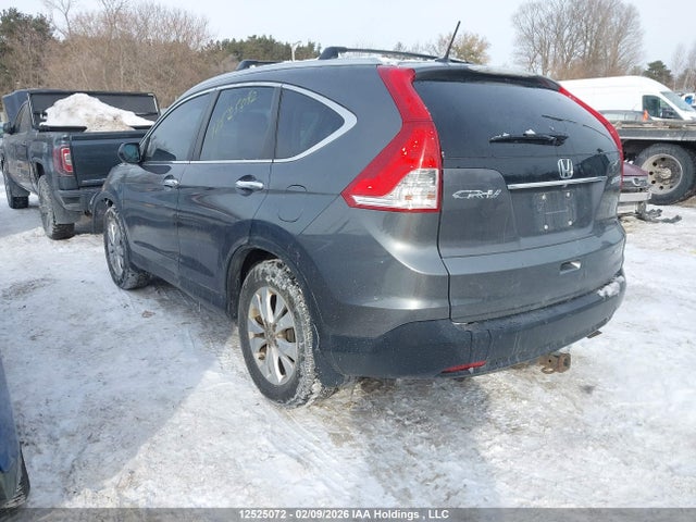 2014 Honda Cr-v Touring მანქანა იყიდება აუქციონზე, vin: 2HKRM4H91EH100348, აუქციონის ნომერი: 12525072