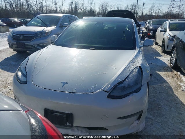 5YJ3E1EA9LF704001 Tesla Model 3 Standard Range Plus