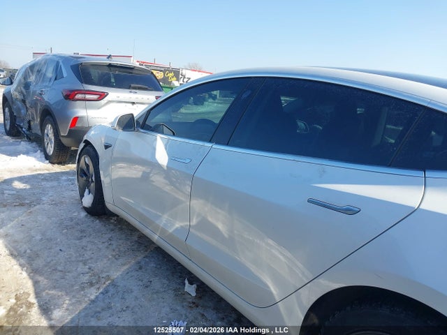 5YJ3E1EA9LF704001 Tesla Model 3 Standard Range Plus