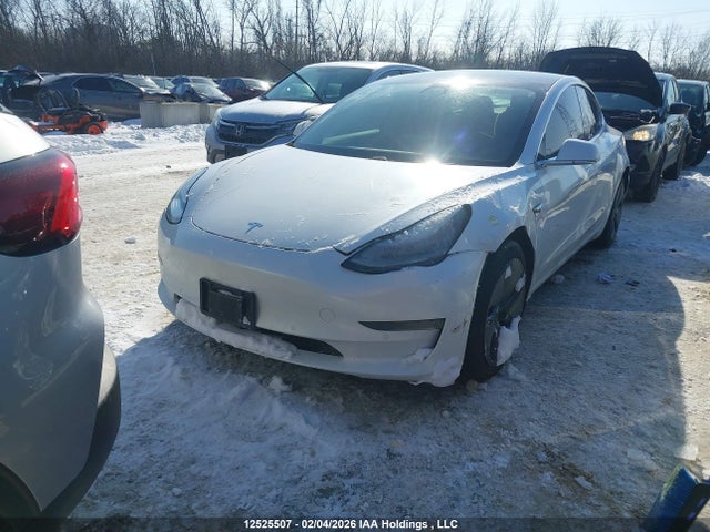 5YJ3E1EA9LF704001 Tesla Model 3 Standard Range Plus