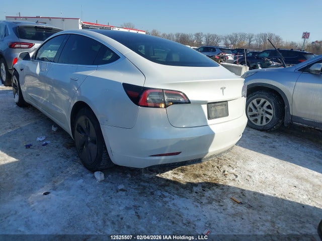 5YJ3E1EA9LF704001 Tesla Model 3 Standard Range Plus