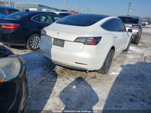 5YJ3E1EA9LF704001 Tesla Model 3 Standard Range Plus