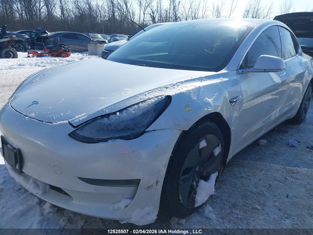 5YJ3E1EA9LF704001 Tesla Model 3 Standard Range Plus