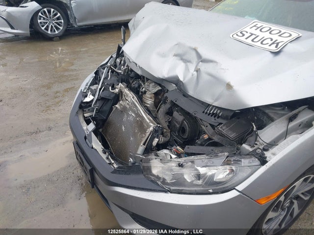 12525864 :رقم المزاد ، 2HGFC2F60JH018599 vin ، 2018 Honda Civic Lx مزاد بيع