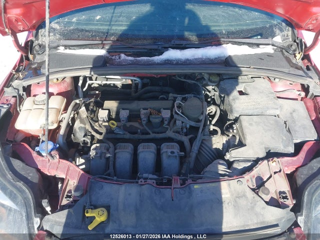12526013 :رقم المزاد ، 1FAHP3N22CL165423 vin ، 2012 Ford Focus Titanium مزاد بيع