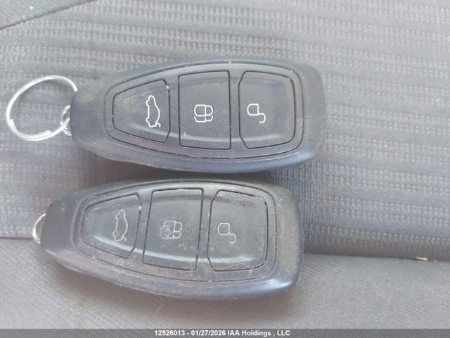 12526013 :رقم المزاد ، 1FAHP3N22CL165423 vin ، 2012 Ford Focus Titanium مزاد بيع