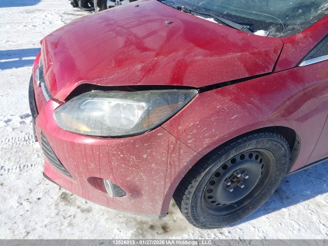 12526013 :رقم المزاد ، 1FAHP3N22CL165423 vin ، 2012 Ford Focus Titanium مزاد بيع