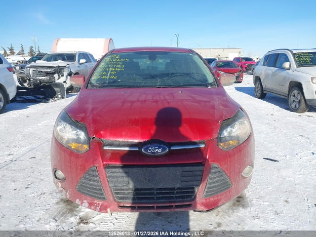 12526013 :رقم المزاد ، 1FAHP3N22CL165423 vin ، 2012 Ford Focus Titanium مزاد بيع