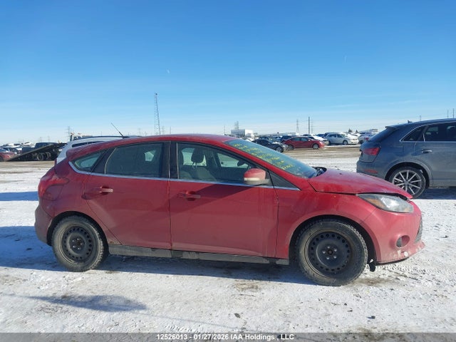 12526013 :رقم المزاد ، 1FAHP3N22CL165423 vin ، 2012 Ford Focus Titanium مزاد بيع
