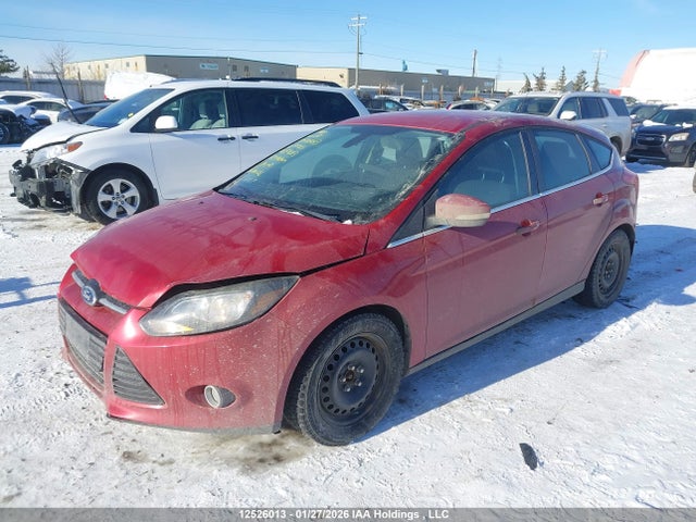 12526013 :رقم المزاد ، 1FAHP3N22CL165423 vin ، 2012 Ford Focus Titanium مزاد بيع