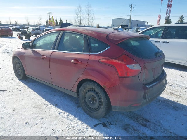 12526013 :رقم المزاد ، 1FAHP3N22CL165423 vin ، 2012 Ford Focus Titanium مزاد بيع