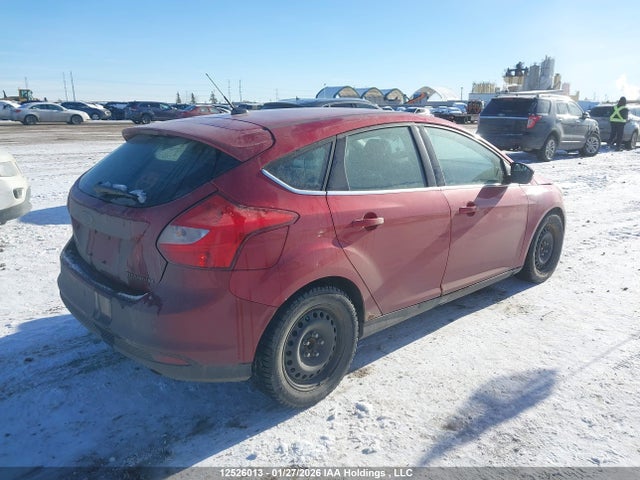 12526013 :رقم المزاد ، 1FAHP3N22CL165423 vin ، 2012 Ford Focus Titanium مزاد بيع