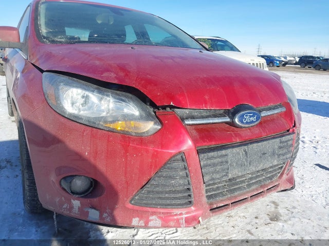 12526013 :رقم المزاد ، 1FAHP3N22CL165423 vin ، 2012 Ford Focus Titanium مزاد بيع
