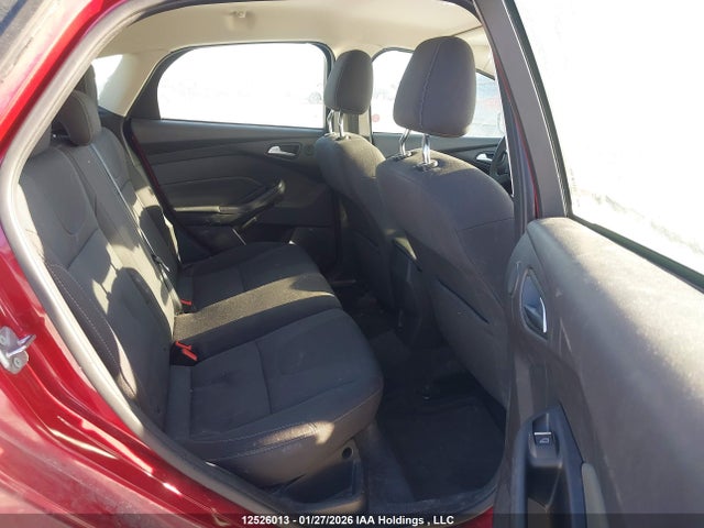 12526013 :رقم المزاد ، 1FAHP3N22CL165423 vin ، 2012 Ford Focus Titanium مزاد بيع