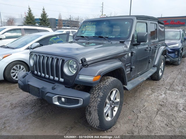 1C4HJXEN1JW287764 Jeep Wrangler Unlimited Sahara
