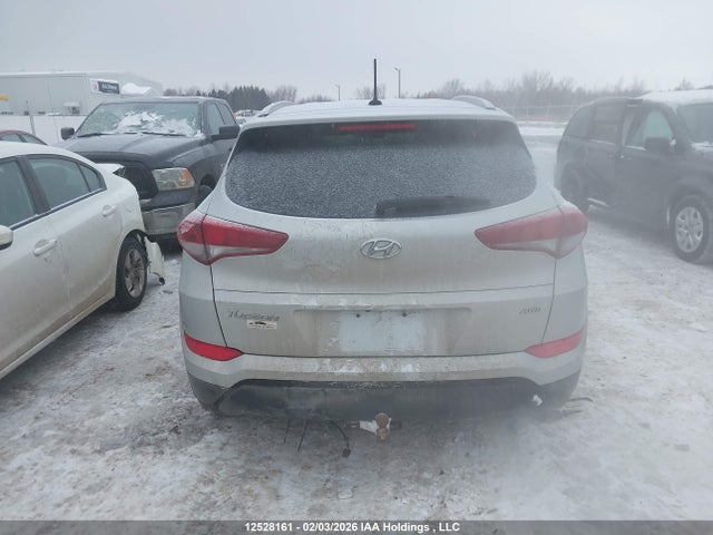 KM8J3CA40GU212605 Hyundai Tucson Premium