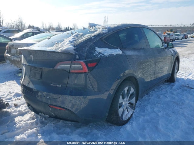 5YJYGDEF7LF039032 Tesla Model Y Long Range/performance