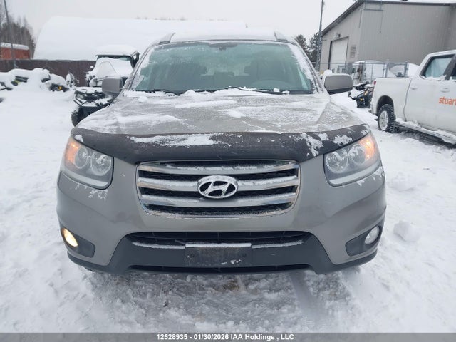 12528935 :رقم المزاد ، 5XYZGDAB8CG147448 vin ، 2012 Hyundai Santa Fe مزاد بيع