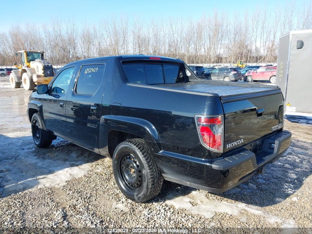 12529029 :رقم المزاد ، 5FPYK1F57EB501943 vin ، 2014 Honda Ridgeline Rtl مزاد بيع