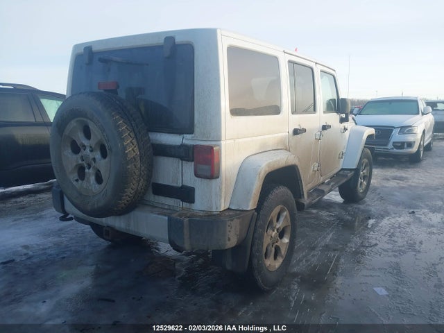 1C4BJWEG9EL135773 Jeep Wrangler Unlimited Sahara