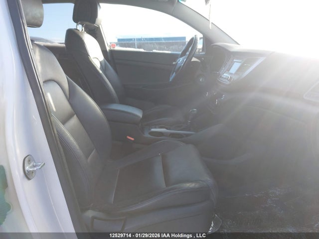 KM8J3CA49HU492395 Hyundai Tucson