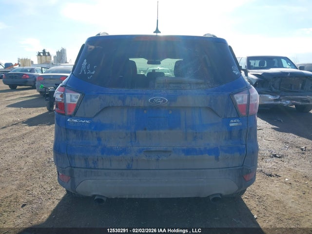 12530291 :رقم المزاد ، 1FMCU9HD0JUC82627 vin ، 2018 Ford Escape Sel مزاد بيع