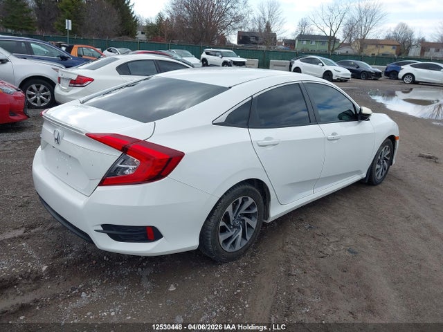 2HGFC2F64JH043327 Honda CIVIC SE