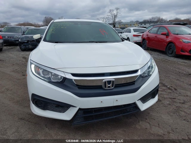 2HGFC2F64JH043327 Honda CIVIC SE