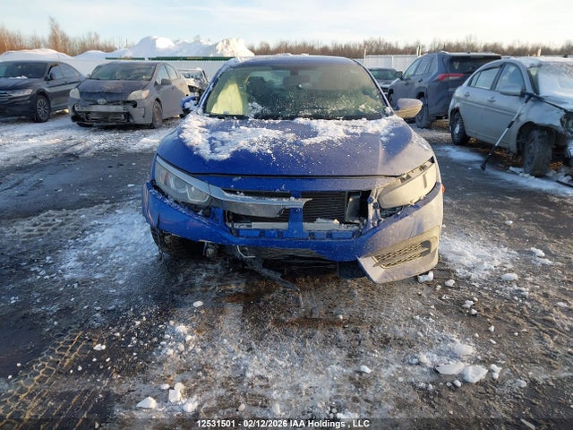 12531501 :رقم المزاد ، 2HGFC2E53JH013051 vin ، 2018 Honda Civic مزاد بيع