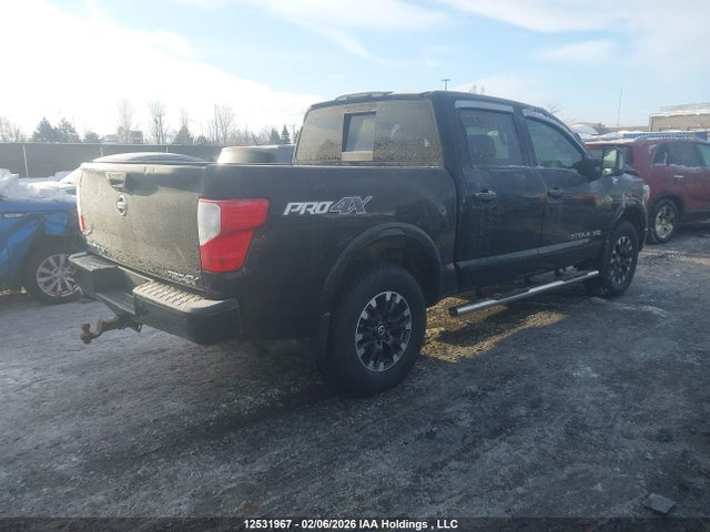 12531967 :رقم المزاد ، 1N6AA1E58KN528741 vin ، 2019 Nissan Titan Platinum/pro-4x/s/sl Midnight Edition/sv/sv Midnight Edition مزاد بيع