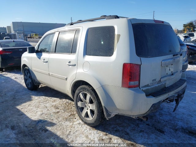 Продажа на аукционе авто 2011 Honda Pilot Touring, vin: 5FNYF4H96BB505573, номер лота: 12533824